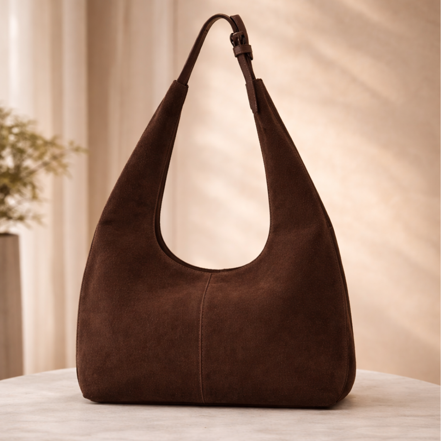 Cartera Río de gamuza chocolate confeccionada artesanalmente por La Pampa Leather.